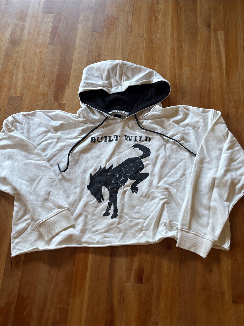 Alice + Olivia Cream Hoodie with Black Bronco Motif